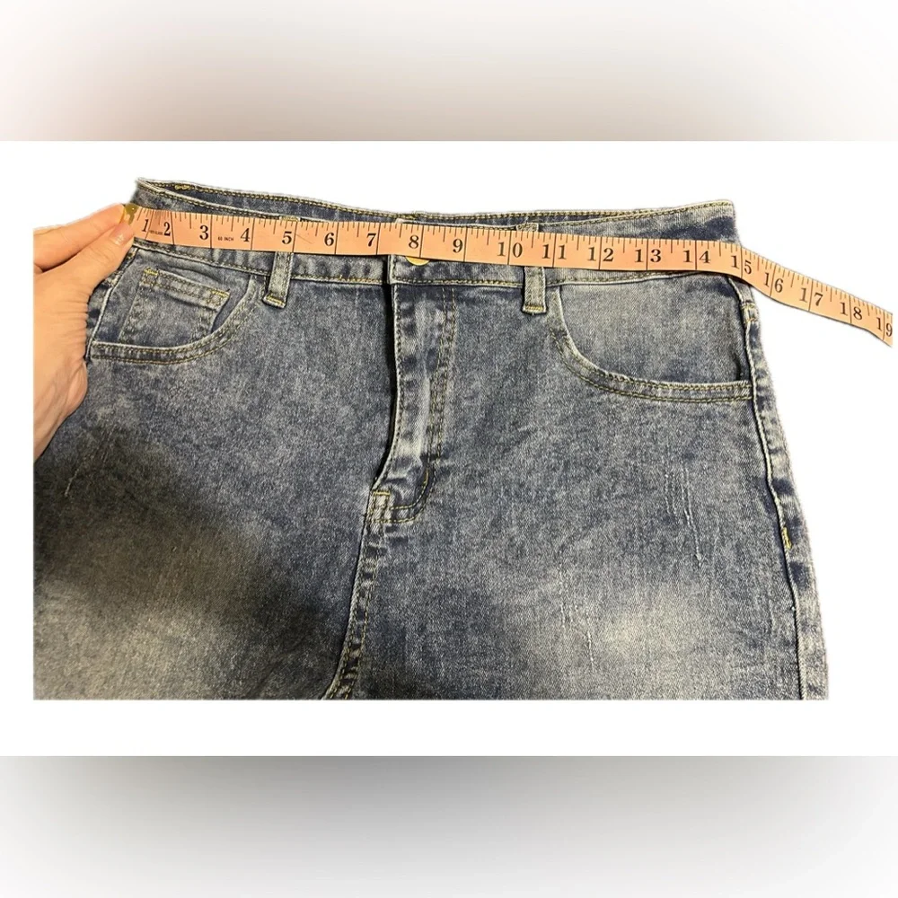 NWOT Denim Shorts with Lace Hem.